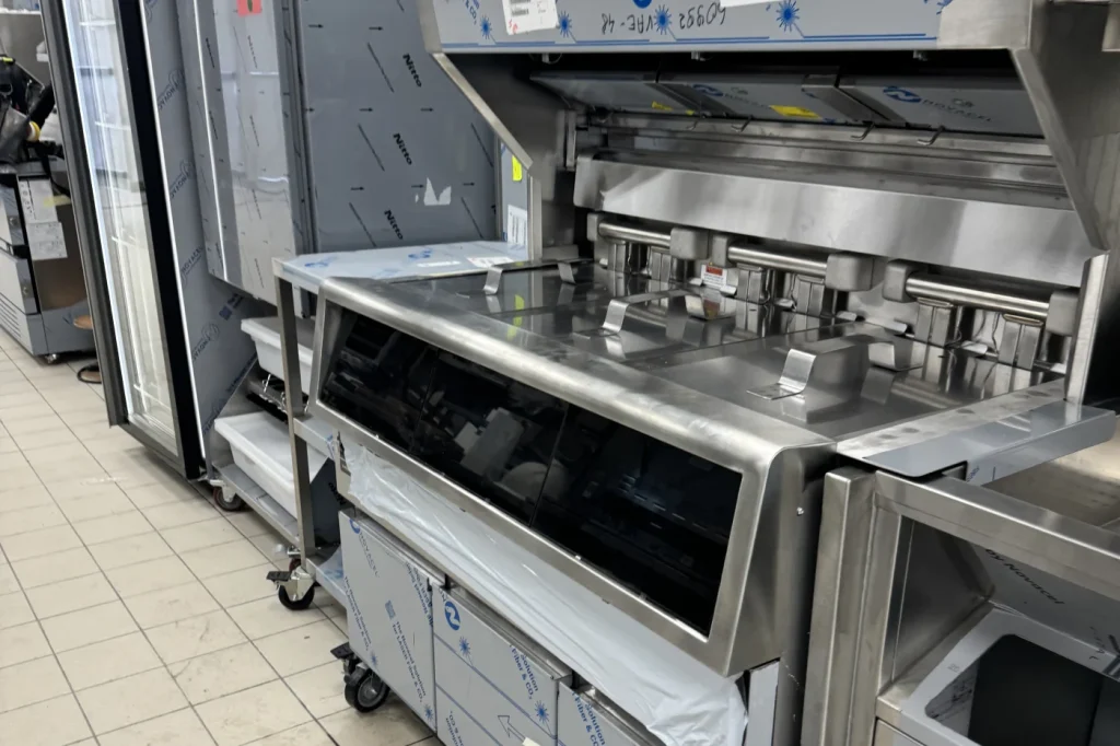 New fryer suite being installed in a commercial kitchen