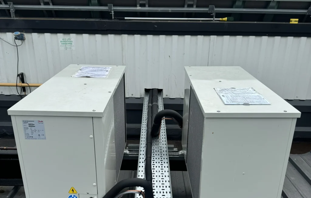 Fixus engineer servicing a commercial refrigeration unit